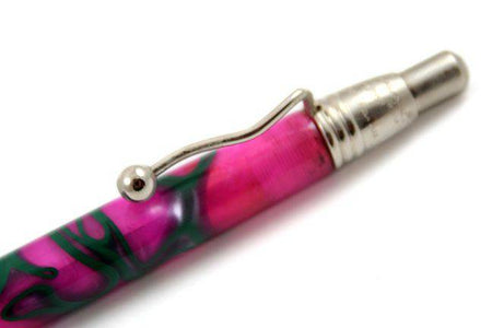 Jean-Pierre Lepine Indigo Classic Murano ballpoint pen with pink ink and green filet design, featuring a sleek, elegant appearance.