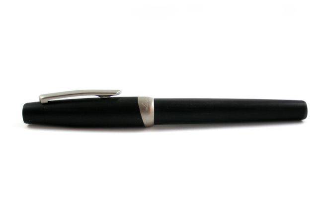 Black Jean-Pierre Lepine Yuzu rollerball pen with sleek design and silver accents, perfect for writing and professional use.