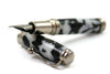 Jean-Pierre Lepine Indigo Classic Murano fountain pen in black and white with a sleek design and fine nib, showcasing elegant craftsmanship.