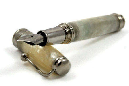 Jean-Pierre Lepine Indigo Classic Murano fountain pen with champagne-colored body and fine nib, elegant writing instrument.