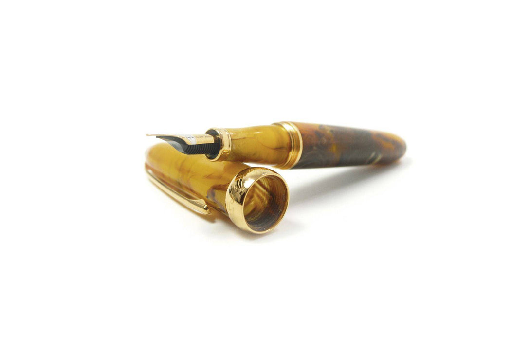 Gold Jean-Pierre Lepine Winston fountain pen with fine nib, featuring a sleek design and elegant detailing.