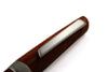Jean-Pierre Lepine Yuzu fountain pen with cocobolo wood barrel and gold accents, close-up of the elegant writing instrument.