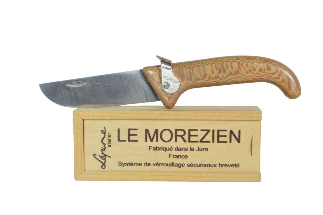 Jean-Pierre Lepine Le Morezien knife with oak handle, showcasing its polished blade and handcrafted craftsmanship.