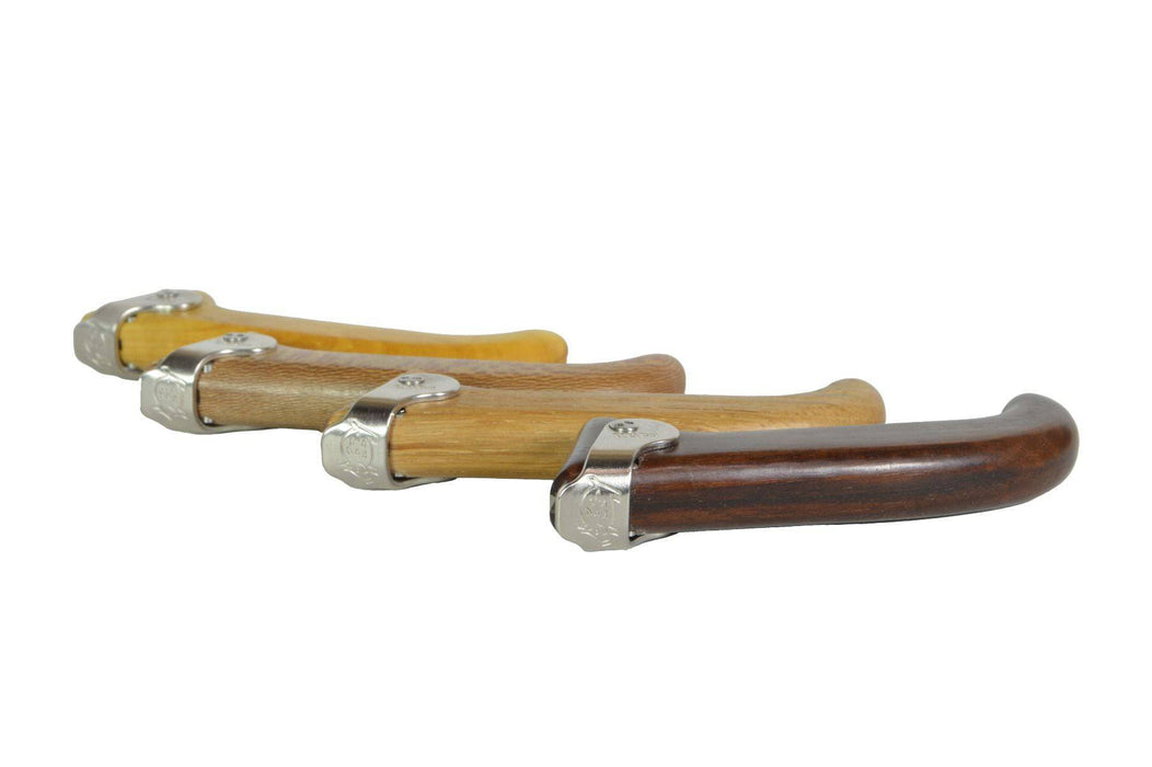 Jean Pierre Lepine Le Morezien knife with oak handle, showcasing a sleek, handcrafted design and polished blade.