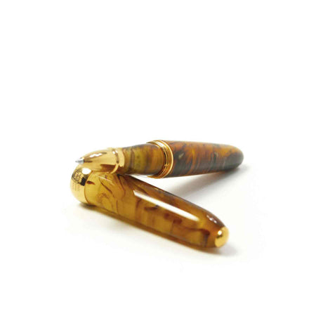 Jean-Pierre Lepine Winston gold rollerball pen with sleek design and smooth writing tip.