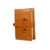 Medium orange Italian leather refillable latch journal with pages, ideal for daily planning or journaling by Il Cartiglio.