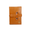 Medium orange Italian leather refillable latch journal with a classic cover, ideal for daily planning and note-taking.