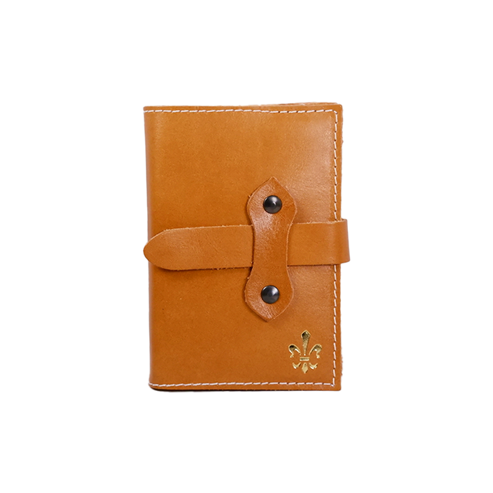 Medium orange Italian leather refillable latch journal with a classic cover, ideal for daily planning and note-taking.