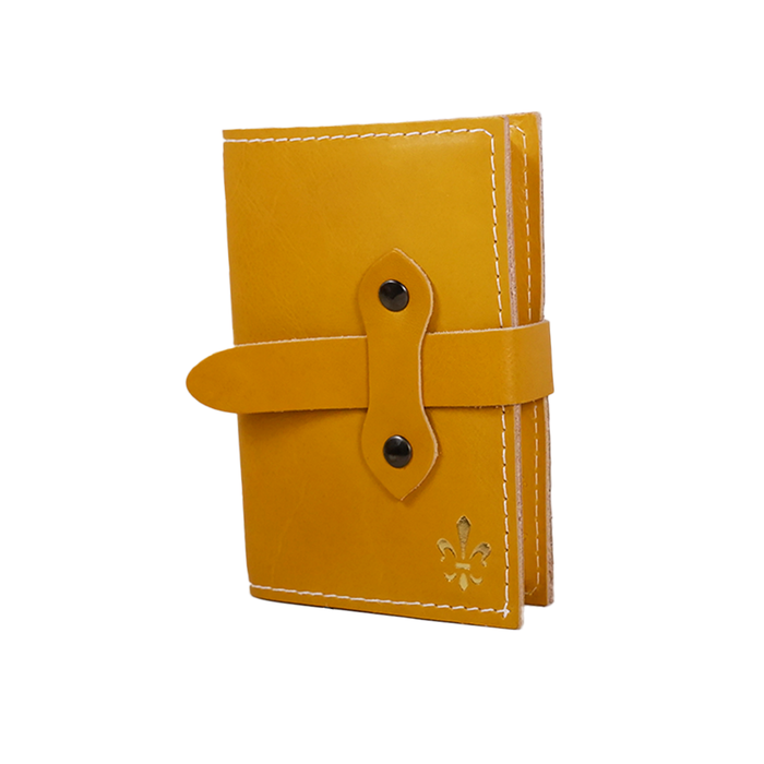 Yellow Italian leather refillable latch journal with a medium size, designed for daily planning and note-taking by Il Cartiglio.