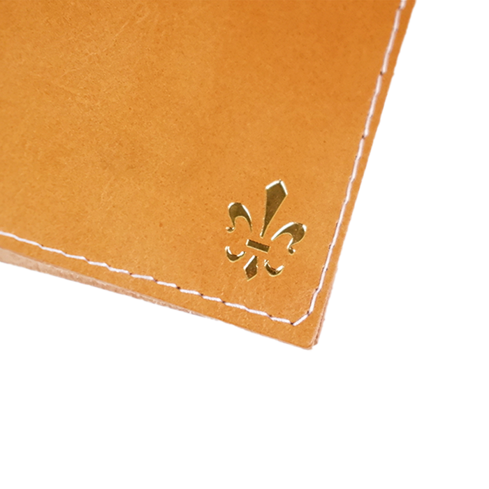 Yellow Italian leather refillable latch daily planner journal by Il Cartiglio with a sleek cover and secure latch closure.