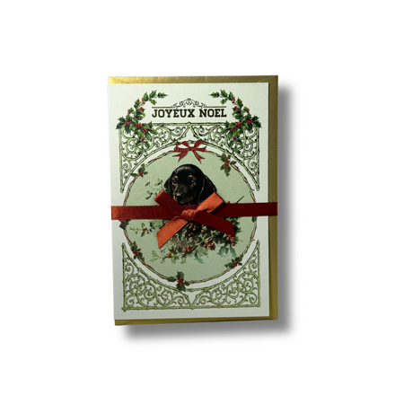 Rossi Christmas Card featuring a festive design with a joyful puppy and "Joyeux Noel" greeting in vibrant holiday colors.