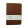Karatis B5 notebook with golden brown cover featuring Tomoe River paper, showcasing a sleek, compact design ideal for writing.