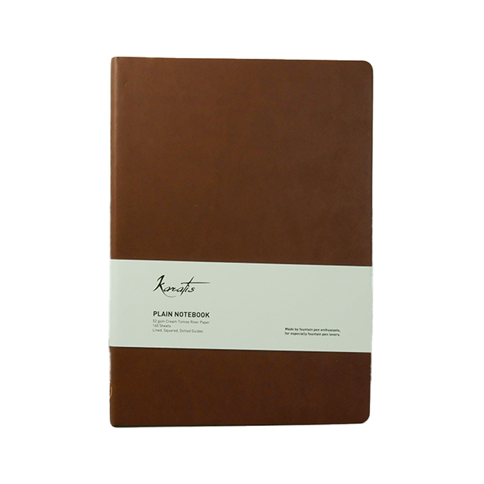Karatis B5 notebook with golden brown cover featuring Tomoe River paper, showcasing a sleek, compact design ideal for writing.