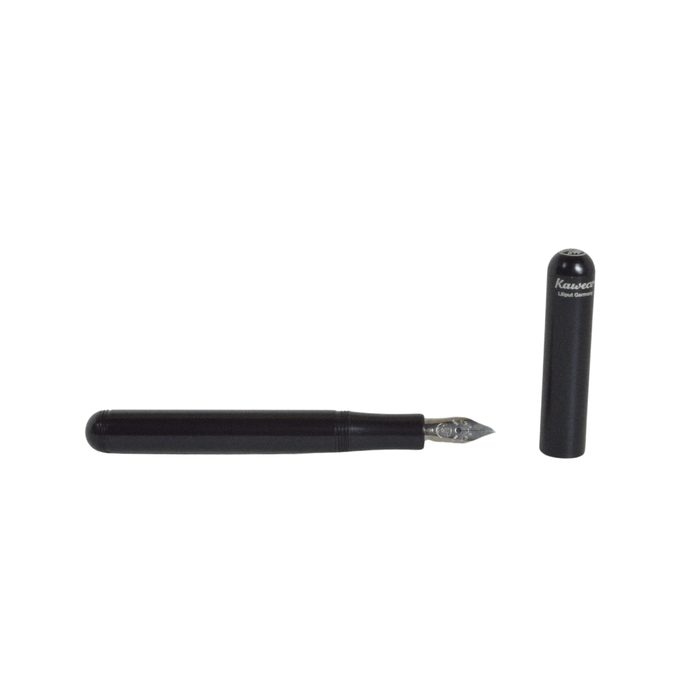 Black Kaweco Liliput fountain pen with an elegant compact design, featuring a fine nib and smooth ink flow.