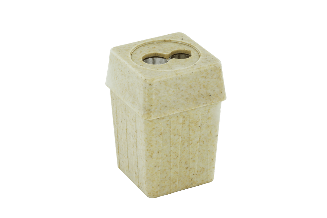 KUM Biofibre pencil sharpener in white with a compact design, featuring a transparent shavings container and ergonomic grip.