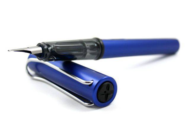 Lamy AL Star black fountain pen with steel extra-fine nib, showcasing sleek design and fine writing tip.