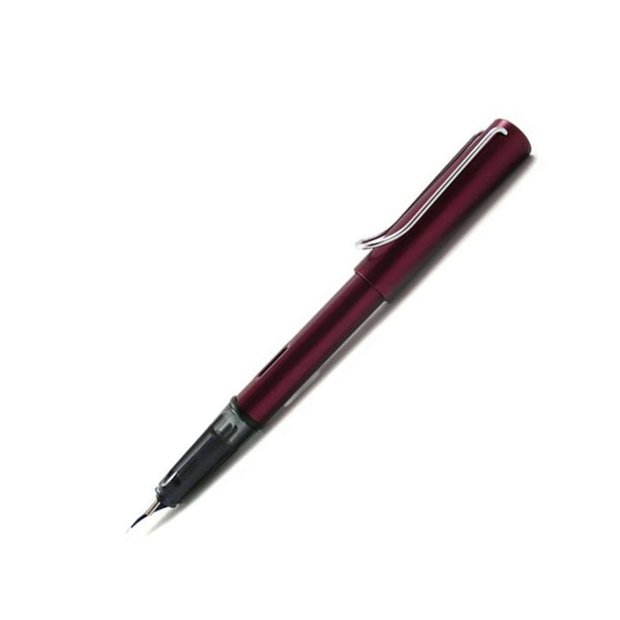 Lamy AL Star black fountain pen with extra-fine steel nib, showcasing sleek design and smooth writing tip.
