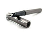 Lamy AL Star black fountain pen with extra-fine steel nib, sleek design, and ergonomic grip for smooth writing.