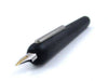 Lamy Dialog 3 fountain pen with gold accents and an extra-fine nib, showcasing its sleek, modern design and premium craftsmanship.