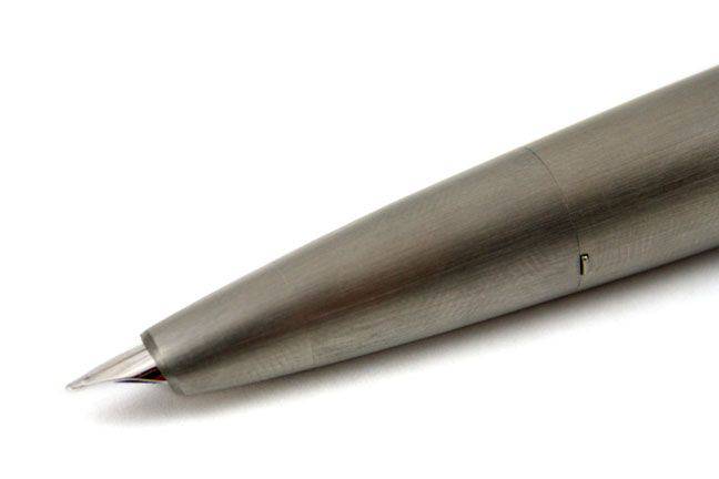 Lamy 2000 stainless steel fountain pen with gold accents, featuring a sleek design and fine nib, designed for smooth writing.