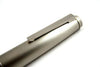 Lamy 2000 stainless steel fountain pen with extra-fine nib, showcasing sleek silver body and elegant design.