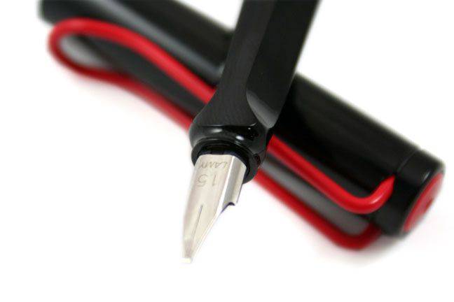 Lamy Joy fountain pen with steel calligraphy nib, showcasing a sleek design and 1.1mm tip for elegant writing.