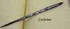 Le Potier D'etain pewter dip calligraphy pen with fleur-de-lys design, featuring a traditional nib and ornate handle.