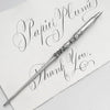 Le Potier D'etain pewter calligraphy dip pen with fleur-de-lys design, featuring a sleek and elegant pen tip for artistic writing.