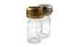 Bronze 10 ml ink bottle from Le Potier D'etain with a floral design, showcasing its elegant glass container.