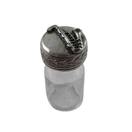 Le Potier D'Étain 15ml ink bottle with pewter top, featuring a saxophone design, used for fountain pen ink or decorative writing.