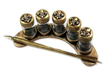 Bronzed Crescent Five Ink Bottle Set by Le Potier D'etain featuring five elegant ink bottles with intricate filigree design.