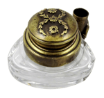 Bronze triangle inkwell set with a quill and decorative garland by Le Potier D'etain, vintage-style desk accessory.