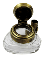 Bronze triangle inkwell set with quill and garland from Le Potier D'etain, featuring elegant vintage ink bottle and writing accessories.