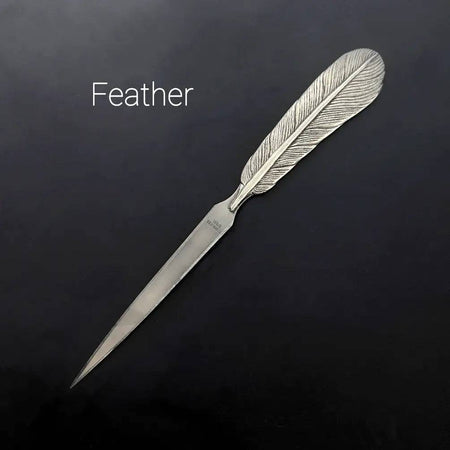 Le Potier D'Étain pewter letter opener with feather design, elegant and polished for opening mail easily.