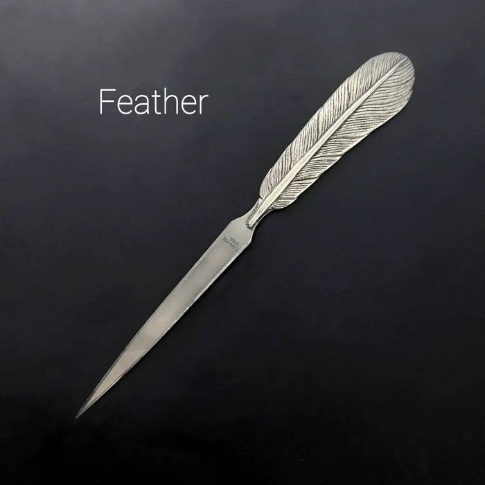 Le Potier D'Étain pewter letter opener with feather design, elegant and polished for opening mail easily.