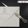Le Potier D'Étain pewter letter opener with a feather design, elegant and detailed for opening mail smoothly.