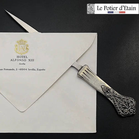 Le Potier D'Étain pewter letter opener with a feather design, elegant and detailed for opening mail smoothly.