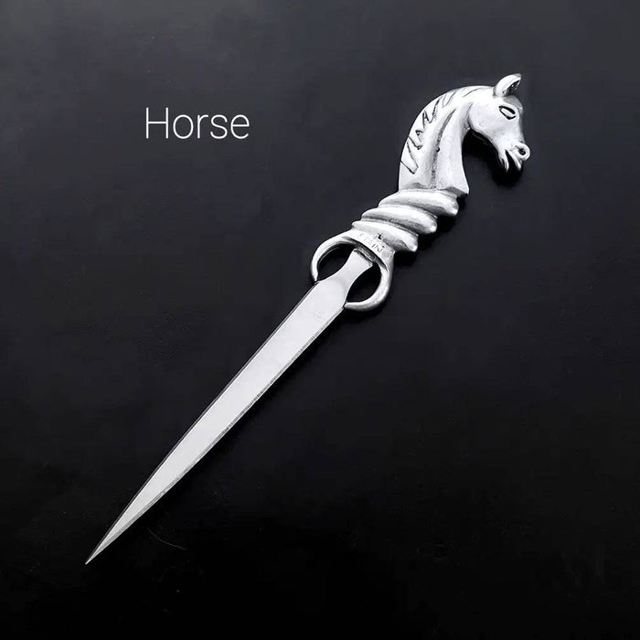 Le Potier D'Étain pewter letter opener with feather design, elegant and handcrafted for opening mail smoothly.