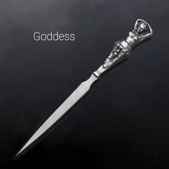 Le Potier D'Étain pewter letter opener with feather design, elegant and smooth, perfect for opening mail with style.