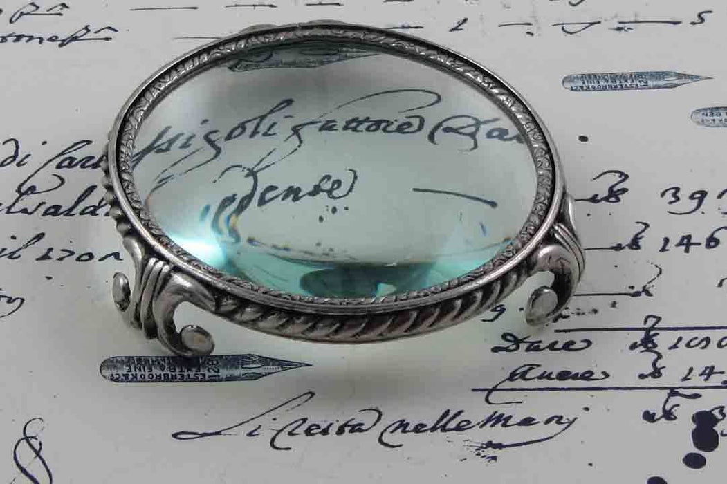 Large pewter magnifying glass on feet, circular design by Le Potier D'etain, detailed close-up of the vintage-style magnifier.