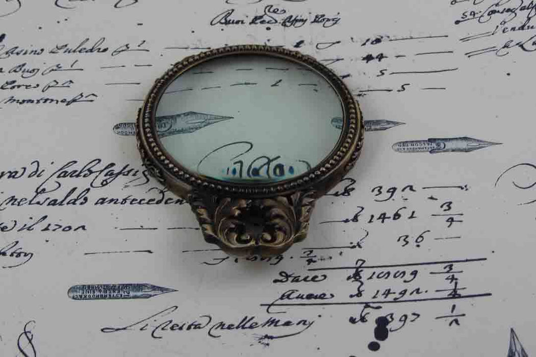 Le Potier D'Etain large pewter magnifying glass with handle and acanthus design, ideal for detailed viewing or decorative display.