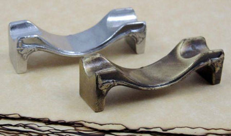 Flat pewter pen rest by Le Potier D'etain, designed to hold pens and writing instruments on a desk or workspace.