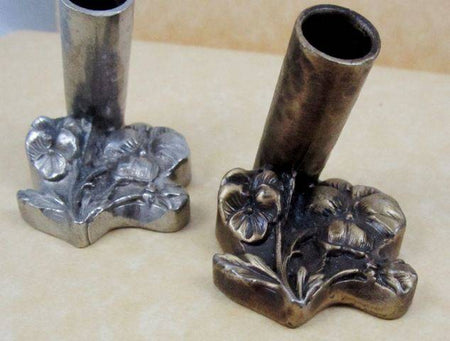 Le Potier D'etain pewter flower-shaped pen rest with intricate floral design, perfect for desk organization and decor.