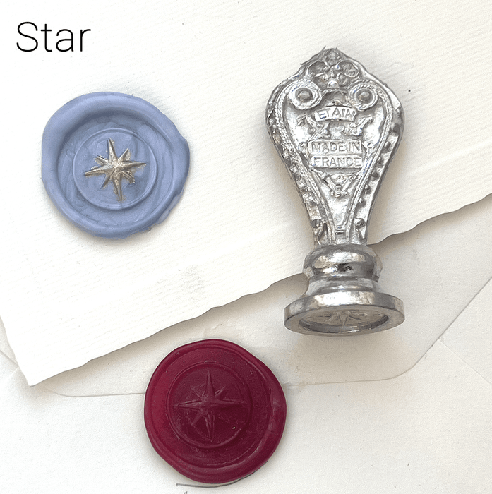 Le Potier D'etain wax seal with anchor design, featuring intricate detailing in a classic wax seal style.