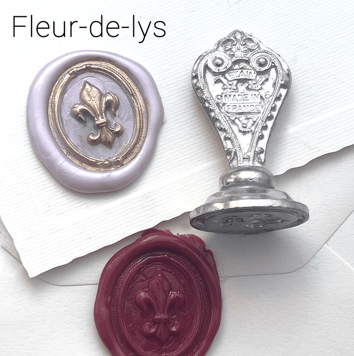Le Potier D'etain wax seal with anchor design, featuring a polished metallic finish and intricate engraved details.