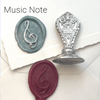 Le Potier D'etain wax seal with anchor design, crafted from metal, showcasing intricate details on a white background.