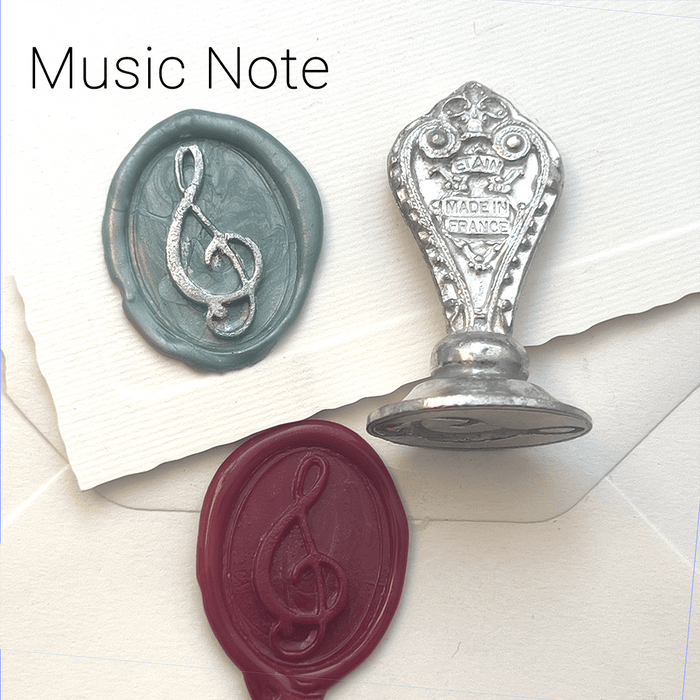 Le Potier D'etain wax seal with anchor design, crafted from metal, showcasing intricate details on a white background.