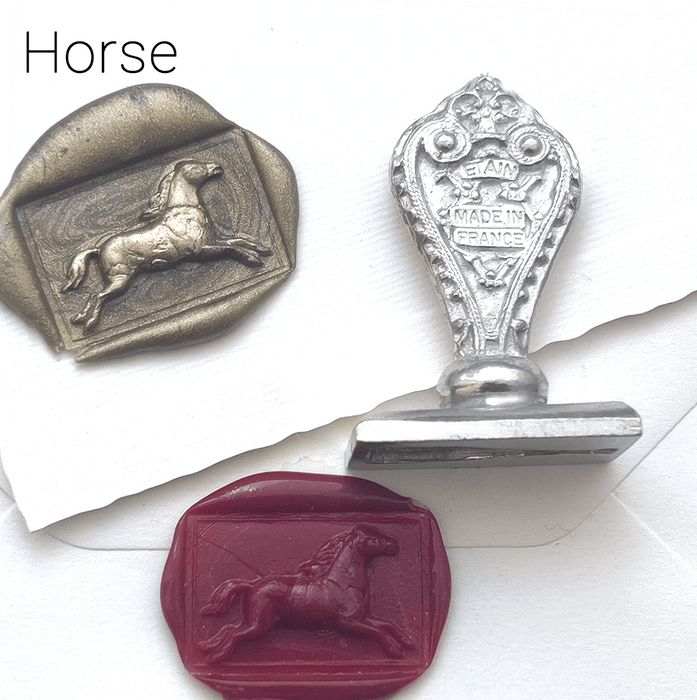 Le Potier D'etain wax seal with anchor design, featuring intricate metal craftsmanship and classic maritime motif.