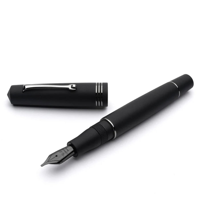 Open Leonardo Momento Zero Black Matte Fountain Pen with Ruthenium accents, showcasing its sleek design and fine nib.