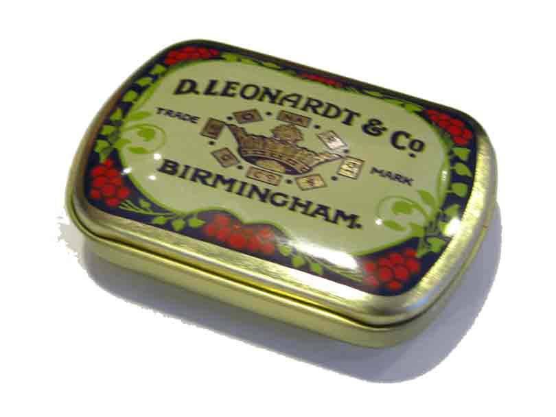 Leonardt British tin box filled with nibs, vintage-style storage container for fountain pen nibs and writing accessories.